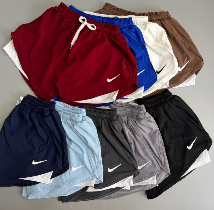 شلوارک ورزشی زنانه نایکی (Nike) مدل دو لایه کشالهدار | فریسایز