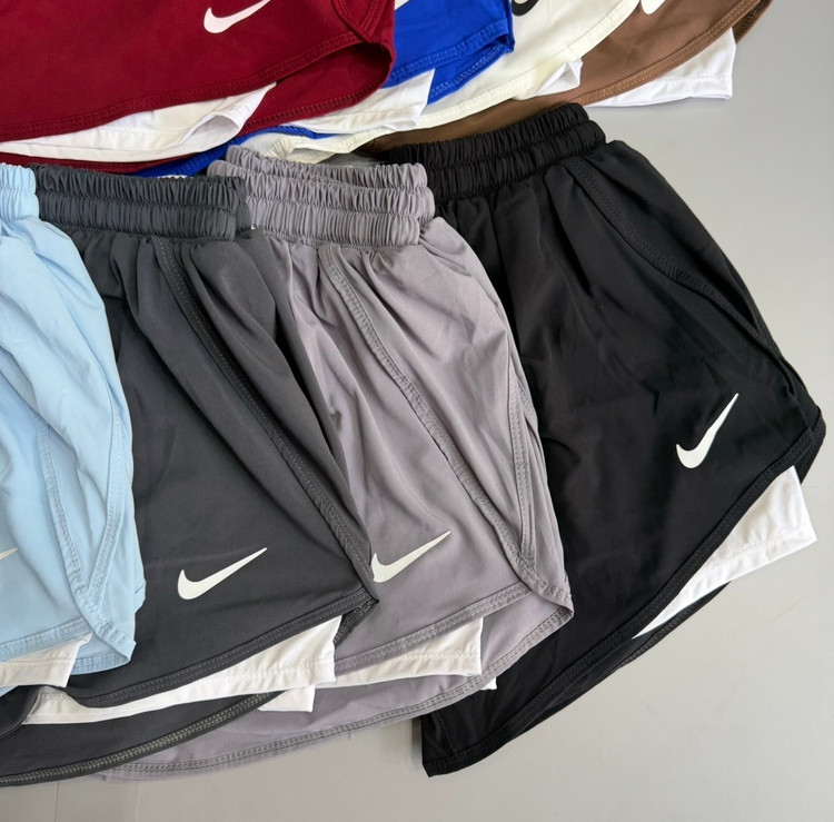 شلوارک ورزشی زنانه نایکی (Nike) مدل دو لایه کشالهدار | فریسایز