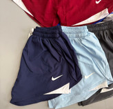 شلوارک ورزشی زنانه نایکی (Nike) مدل دو لایه کشالهدار | فریسایز